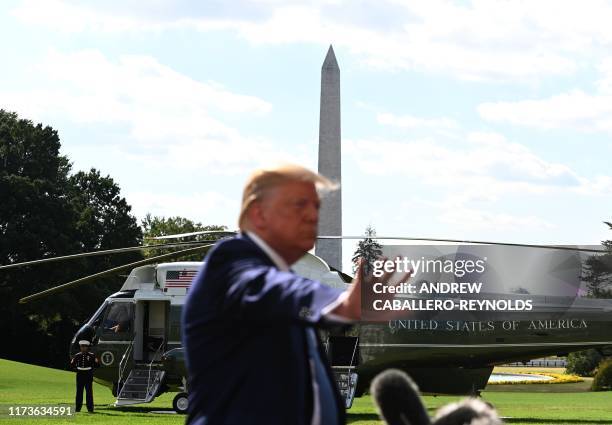 President Donald Trump departs the White House in Washington, DC, for his annual visit to Walter Reed National Military Medical Center, on October 4,...