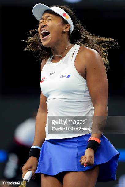 Naomi Osaka of Japan celebrates after defeating Bianca Andreescu of Canada during the Women's singles Quarter Finals of 2019 China Open at the China...
