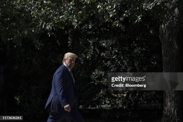 President Donald Trump arrives at the White House after a visit to Walter Reed National Military Medical Center in Washington, D.C., U.S., on Friday,...