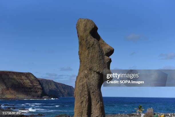 Moai seen at ceremonial platform Ahu Tongariki at Rapa Nui National Park. Moais are monolithic human figures which represented the ancestors. They...