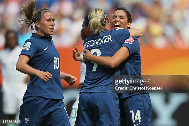 Camille Abily, Eugenie Le Sommer and Louisa Necib of France celebrate the first goal of Marie-Laure Delie of France during the FIFA Women's World Cup...