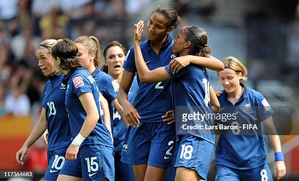 Marie Laure Delie of France celebrates with Wendie Renard and other team mates after scoring his teams first goal during the FIFA Women's World Cup...