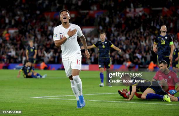 Jadon Sancho of England celebrates after he scores a goal to make it 4-1 during the UEFA Euro 2020 qualifier match between England and Kosovo at St....