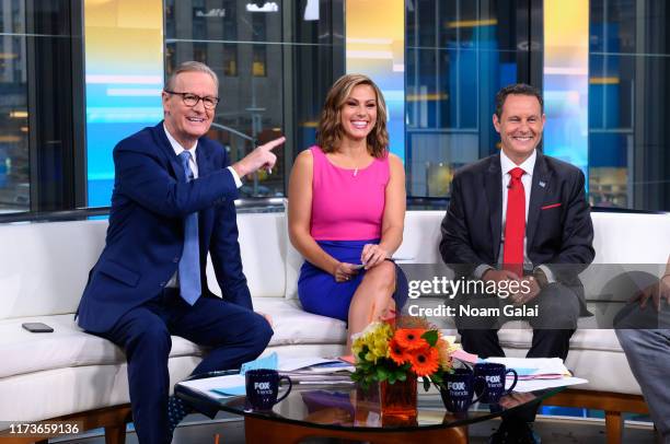 Steve Doocy, Lisa Boothe and Brian Kilmeade are seen on the set of "FOX & Friends" at Fox News Channel Studios on September 10, 2019 in New York City.