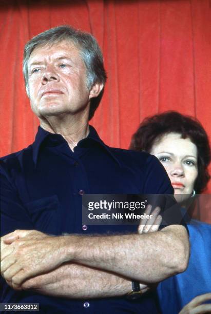 August 1976: Democratic Party nominee Jimmy Carter with wife Rosalynn stands on stage at press conference during the democratic Party Convention in...