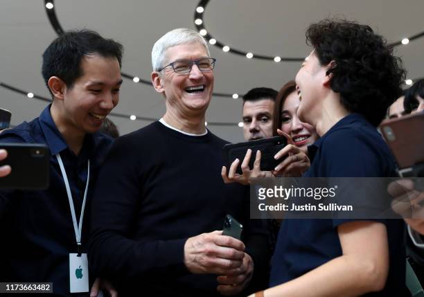 Apple CEO Tim Cook greets attendees during a special event on September 10, 2019 in the Steve Jobs Theater on Apple's Cupertino, California campus....