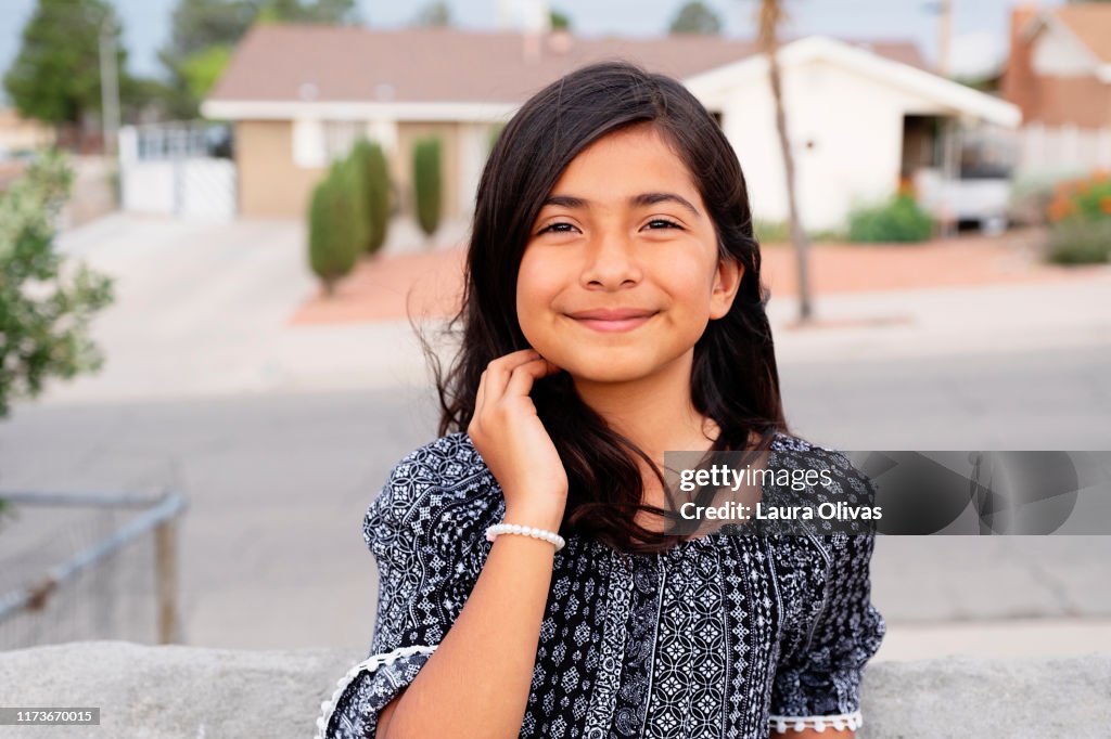 Portrait of Pre-Teen Girl In Her Neighborhood