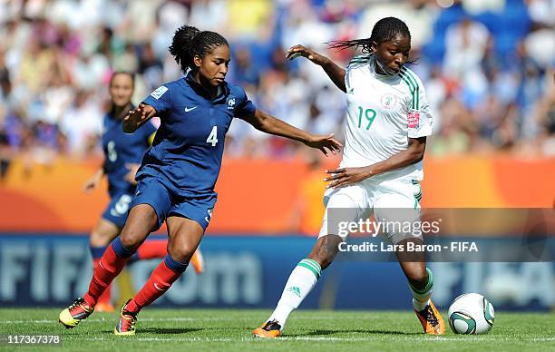 Laura Georges of France challenges Uchechi Sunday of Nigeria during the FIFA Women's World Cup 2011 Group A match between Nigeria and France at...