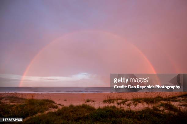 rainbow over ocean - sunrise seascape - jacksonville - florida ストックフォトと画像