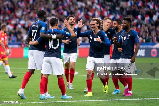 Wissam Ben Yedder of France is congratulated by teammates after scoring during UEFA Euro 2020 qualifier match between France and Andorra at Stade de...