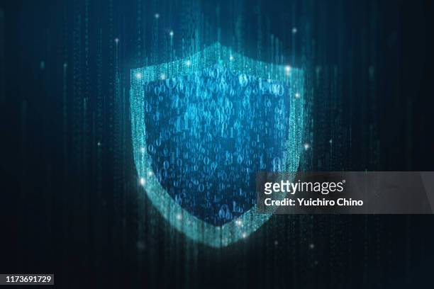 security shield in matrix - antivirussoftware stockfoto's en -beelden