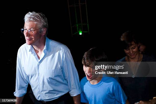 Actor Richard Gere, his wife, Carey Lowell, and son, Homer James Jigme attend a performance of a Ballet entitled "Mahakarya Borobudur" at Aksobya...