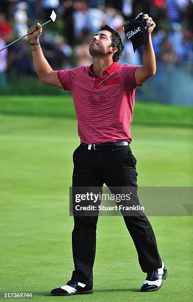 Pablo Larrazabal of Spain celebrates holeing the winning putt during the playoff against Sergio Gracia of Spain after the final round of the BMW...