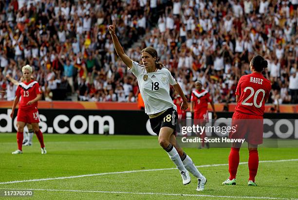 Kerstin Garefrekes of Germany celebrates after scoring their first goal during the FIFA Women's World Cup Group A match between Germany and Canada at...