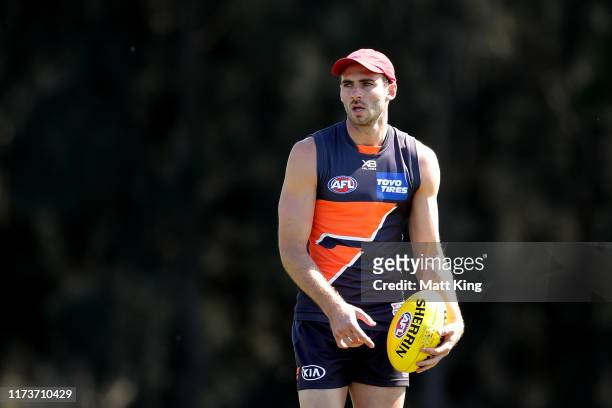 Jeremy Finlayson handles the ball during a Greater Western Sydney Giants AFL media opportunity & training session at the WestConnex Centre on...