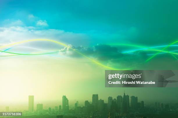 cityscape with abstract light trail - cloud futuristic stock-fotos und bilder