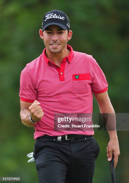 Pablo Larrazabal of Spain celebrates his putt on the seventh hole during the final round of the BMW International Open at Golfclub Munchen Eichenried...