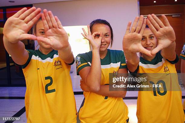 Teigen Allen, Caitlin Foord and Servet Uzunlar of Australia during the FIFA portrait session on June 26, 2011 in Dusseldorf, Germany.