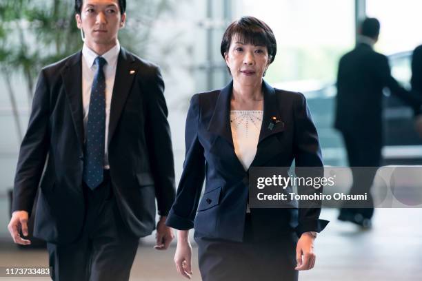 Japan's newly-appointed Minister of Internal Affairs and Communications Sanae Takaichi arrives at the prime minister's official residence on...