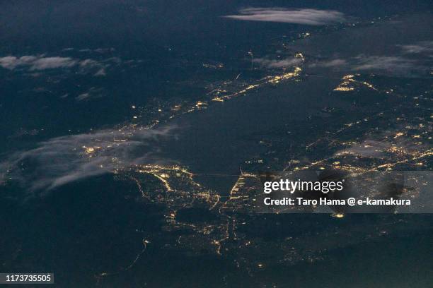 lake biwa in shiga prefecture of japan sunset time aerial view from airplane - préfecture de shiga photos et images de collection