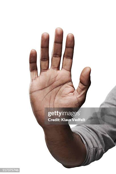 close-up of male hand palm towards camera - open hand stock pictures, royalty-free photos & images