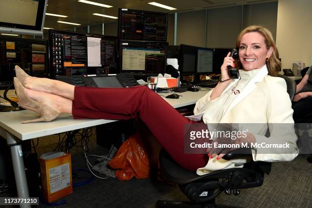 Gabby Logan takes a call during the Sunrise Charity Day on September 11, 2019 in London, England.