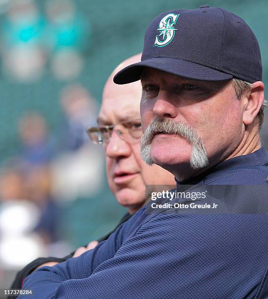 Manager Eric Wedge and General Manager Jack Zduriencik of the Seattle Mariners watch batting practice prior to the game against the Florida Marlins...