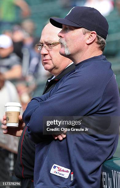 Manager Eric Wedge and General Manager Jack Zduriencik of the Seattle Mariners watch batting practice prior to the game against the Florida Marlins...