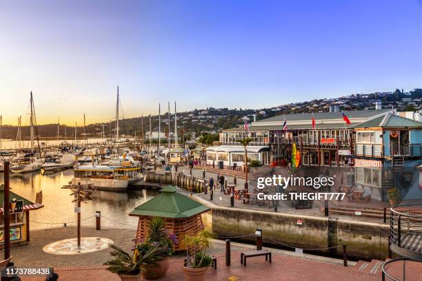 restaurants at knysna waterfront in the western cape province - knysna stock pictures, royalty-free photos & images