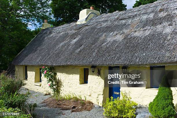 Traditional thatched cottage with lime mortar walls at Gortrevagh, County Galway, Ireland