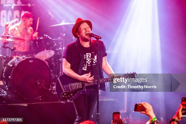 Andy Hurley and Patrick Stump of Fall Out Boy perform during the “Hella Mega Tour” announcement show at Whisky a Go Go on September 10, 2019 in West...