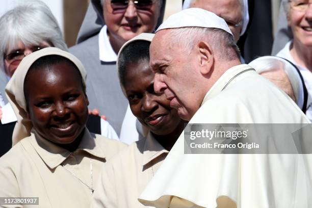 Pope Francis greets nuns during his weekly Audience in St. Peter's square on September 11, 2019 in Vatican City, Vatican.