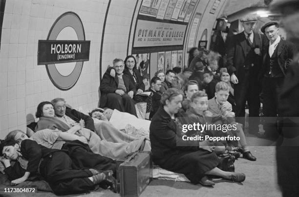 Wartime scene as Londoners seek shelter and bed down on the platform at Holborn underground station to escape from German Luftwaffe air raids during...