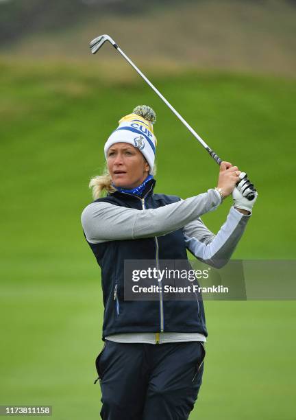 Suzann Pettersen of Team Europe plays a shot during a practice round prior to the start of The Solheim Cup at Gleneagles on September 11, 2019 in...