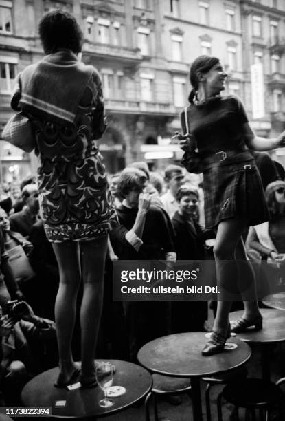 Demonstration for miniskirt in front of Café Odeon, Zurich 1967