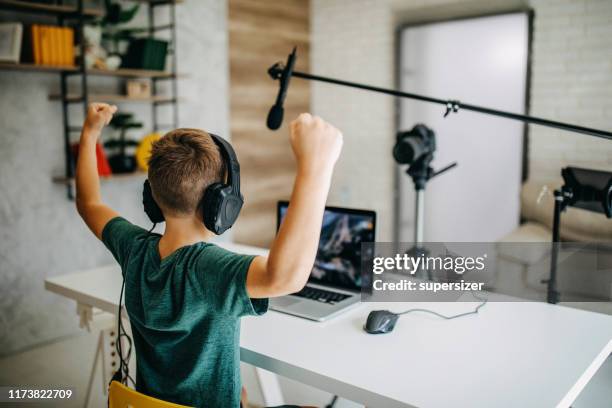 boy making vlog - tutorial stock pictures, royalty-free photos & images