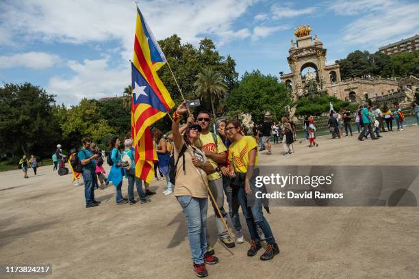 Pro-Independence demonstrators take a selfie at the Ciutadella park on September 11, 2019 in Barcelona, Spain. The celebrations are marked this year...