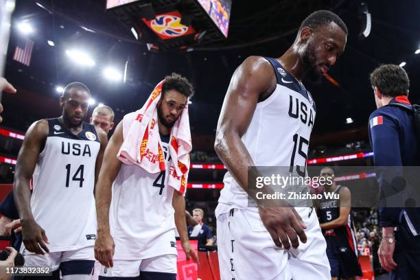 Kemba Walker and Derrick White of USA show their dejection after the quarter final of 2019 FIBA World Cup between USA and France at Dongguan...