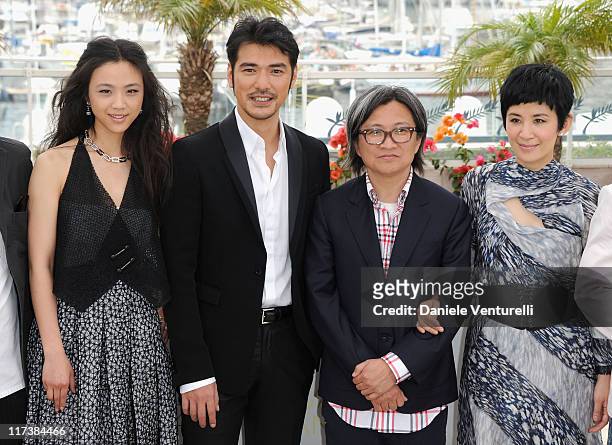 Actors Tang Wei, Takeshi Kaneshiro, director Peter Chan and Sandra Ng Kwan Yu attend the "Wu Xia" Photocall during the 64th Annual Cannes Film...