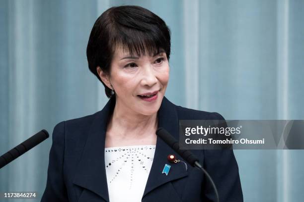 Japan's newly appointed Minister of Internal Affairs and Communications Sanae Takaichi speaks during a press conference at the prime minister's...