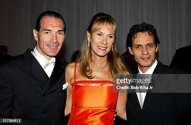 Marc Anthony , MGM chairman and CEO Alex Yemenidjian and child advocate Cheryl Saban in Beverly Hills, Calif. On Saturday, Oct. 2, 2004 for the...