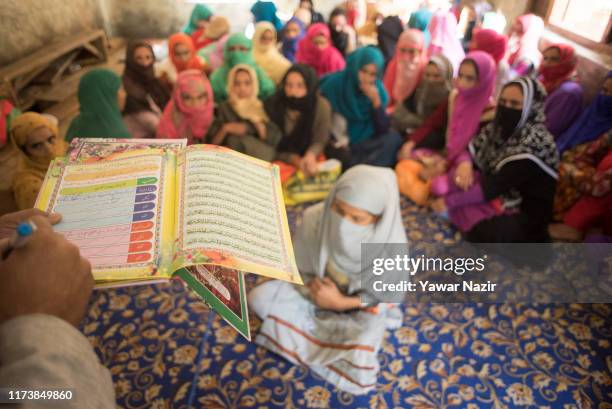 Muslim cleric reads the Islamic marriage contract to Kashmiri Muslim brides from the down trodden section of society as they attend the mass wedding...