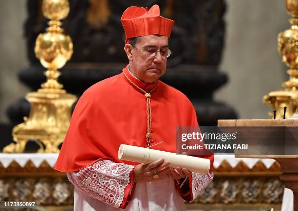 New Cardinal Spanish prelate Miguel Angel Ayuso Guixot reacts after being appointed by the Pope during an Ordinary Public Consistory for the creation...