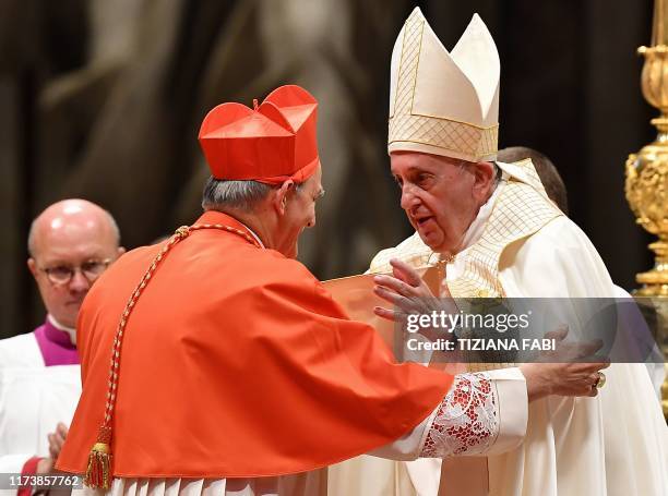 Pope Francis embraces new Cardinal Italian prelate Matteo Maria Zuppi after he appointed him during an Ordinary Public Consistory for the creation of...