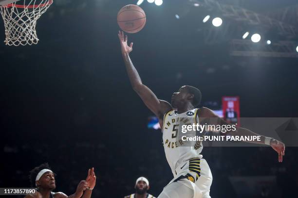 Indiana Pacers player Edmond Sumner shoots the ball during the second pre-season NBA basketball game between Sacramento Kings and Indiana Pacers at...