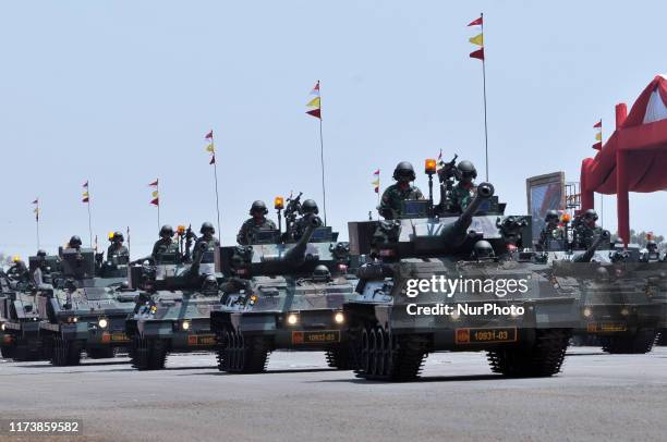 Indonesian National Armed Forces soldiers mounted combat vehicles during the 74th celebration parade at Halim Perdanakusuma Air Force Base, Jakarta,...