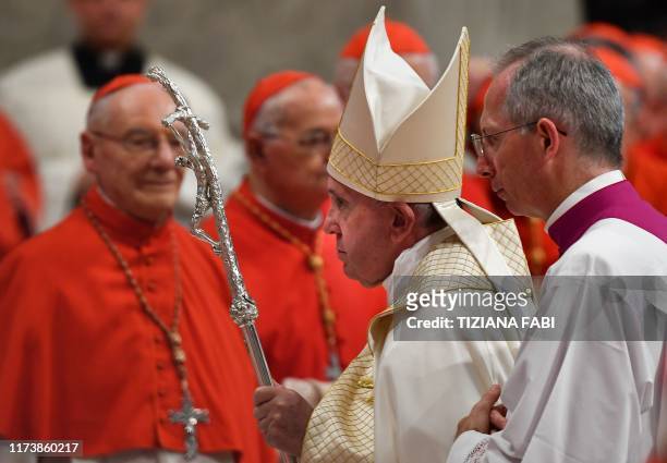 Pope Francis leaves after holding an Ordinary Public Consistory for the creation of new cardinals, for the imposition of the biretta, the consignment...