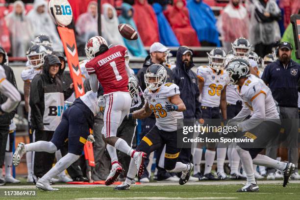 Wisconsin Badgers wide receiver Aron Cruickshank ] fumbles the ball as he tries to gain some extra yards durning a college football game between the...