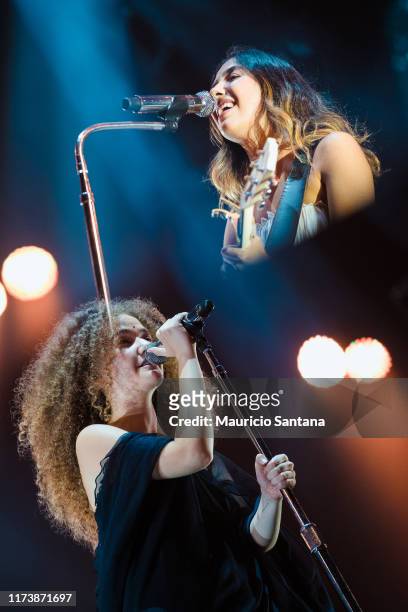 Ana Caetano and Vitoria Falcao of Anavitoria performs live on stage during day 6 of Rock In Rio Music Festival at Cidade do Rock on October 5, 2019...