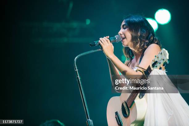 Ana Caetano of Anavitoria performs live on stage during day 6 of Rock In Rio Music Festival at Cidade do Rock on October 5, 2019 in Rio de Janeiro,...